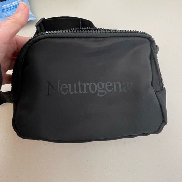 Neutrogena Belt Bag, 1-Lrg Zip Pocket , 1-Smaller Zip Pocket with products. - Picture 2 of 9